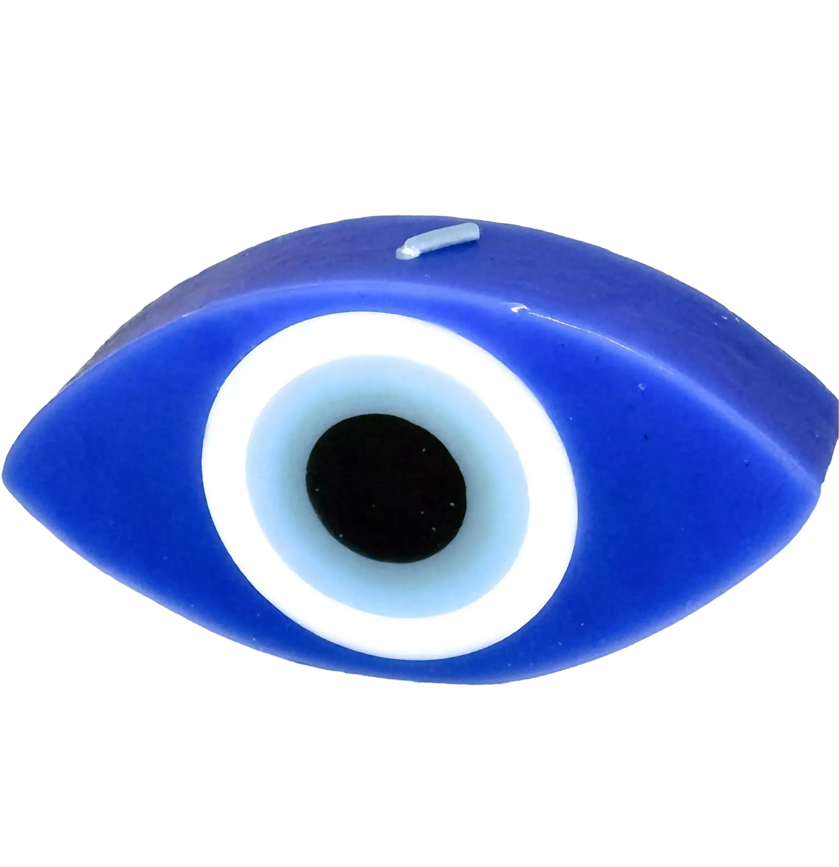 A blue and white object resembling an eye, possibly a candle or a decorative item.